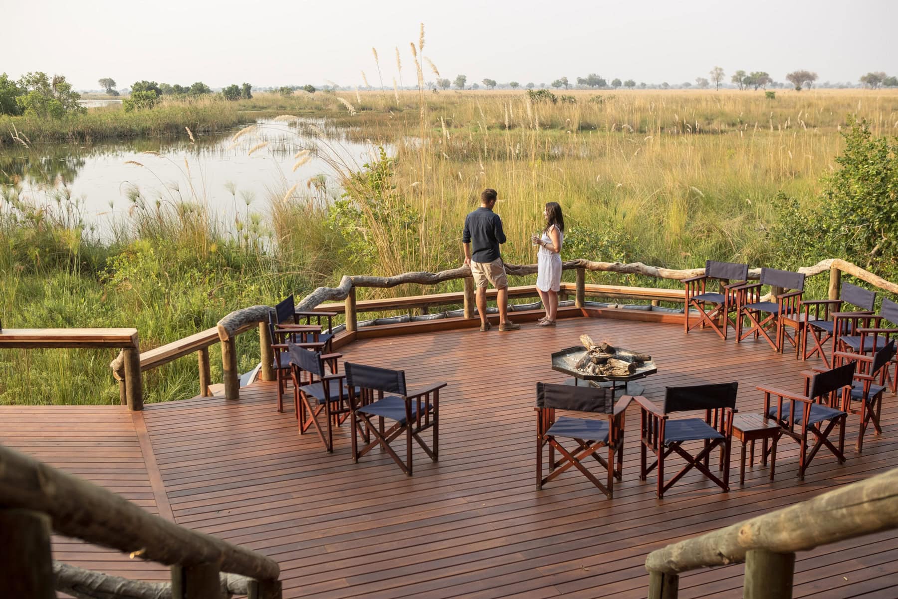Guests on the deck at Shinde in the Okavango Delta, Botswana
