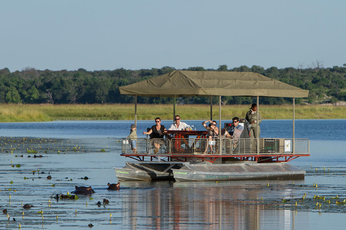 Boat cruise on the Chobe River. Ask our safari experts about your Botswana safari cost.