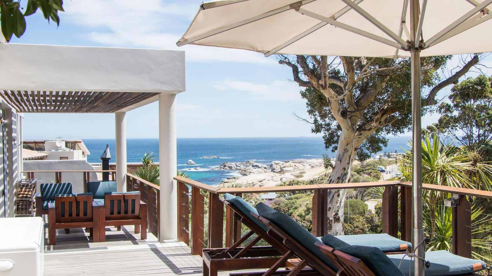 View of the beach from the balcony of Camps Bay Retreat. The perfect start to your Camps Bay Vacation.