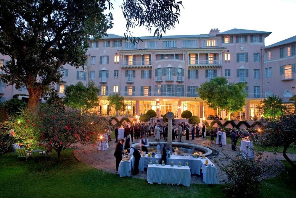 Outside view of the courtyard of the Mount Nelson Hotel at sunset