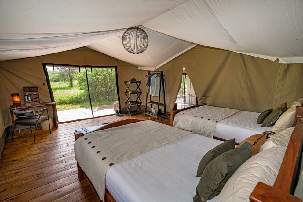 Two single beds inside the Lemala Ndutu Mobile Tented Camp