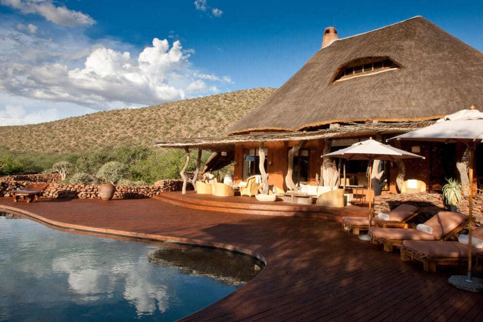 Exterior view of The Motse including the pool, a luxury safari lodge.