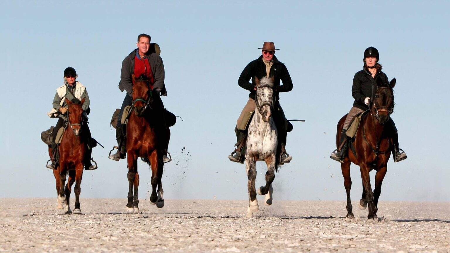 Horse riding over over Makgadikgadi Salt Pans in Botswana