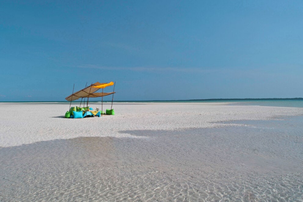 Seating on a sandbank at Funzi Keys, Kenya | Photo credit: Funzi Keys