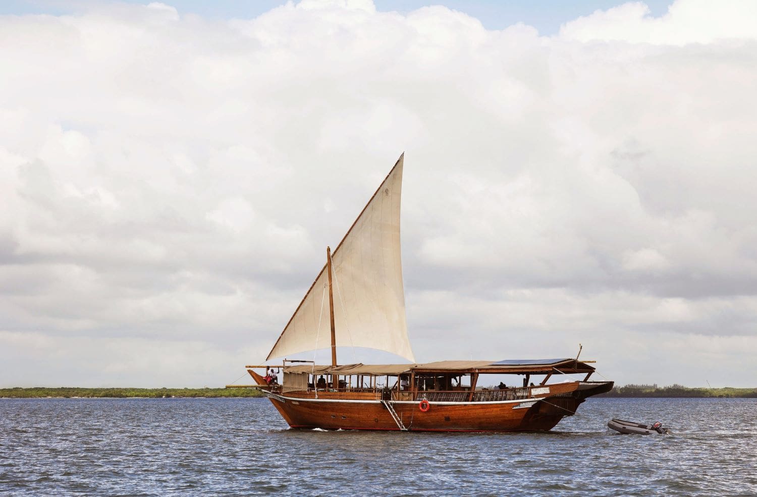 Traditional Dhow off the coast of Lamu, Kenya, and African Island perfect for a beach holiday