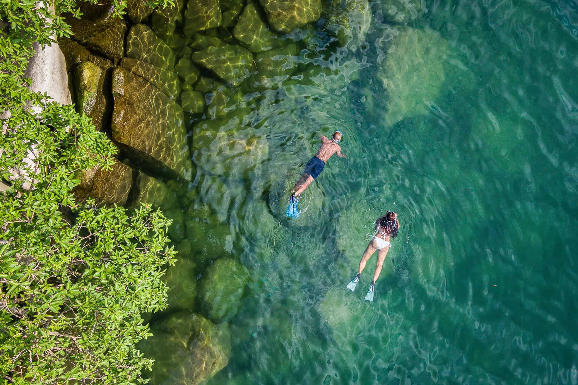 A couple snorkeling in Lake Malawi
