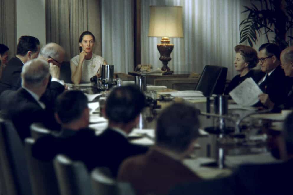 Washington, D.C. - Jane at the head of the table in a meeting