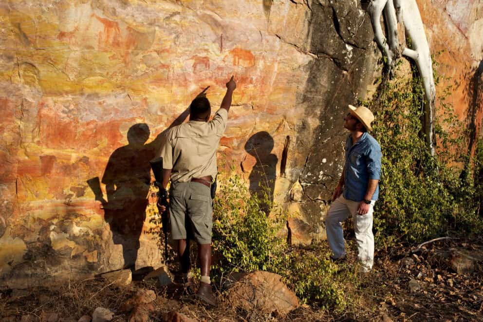 Ancient rock art viewing at Singita Pamushana, Zimbabwe. Photo: Singita Pamushana